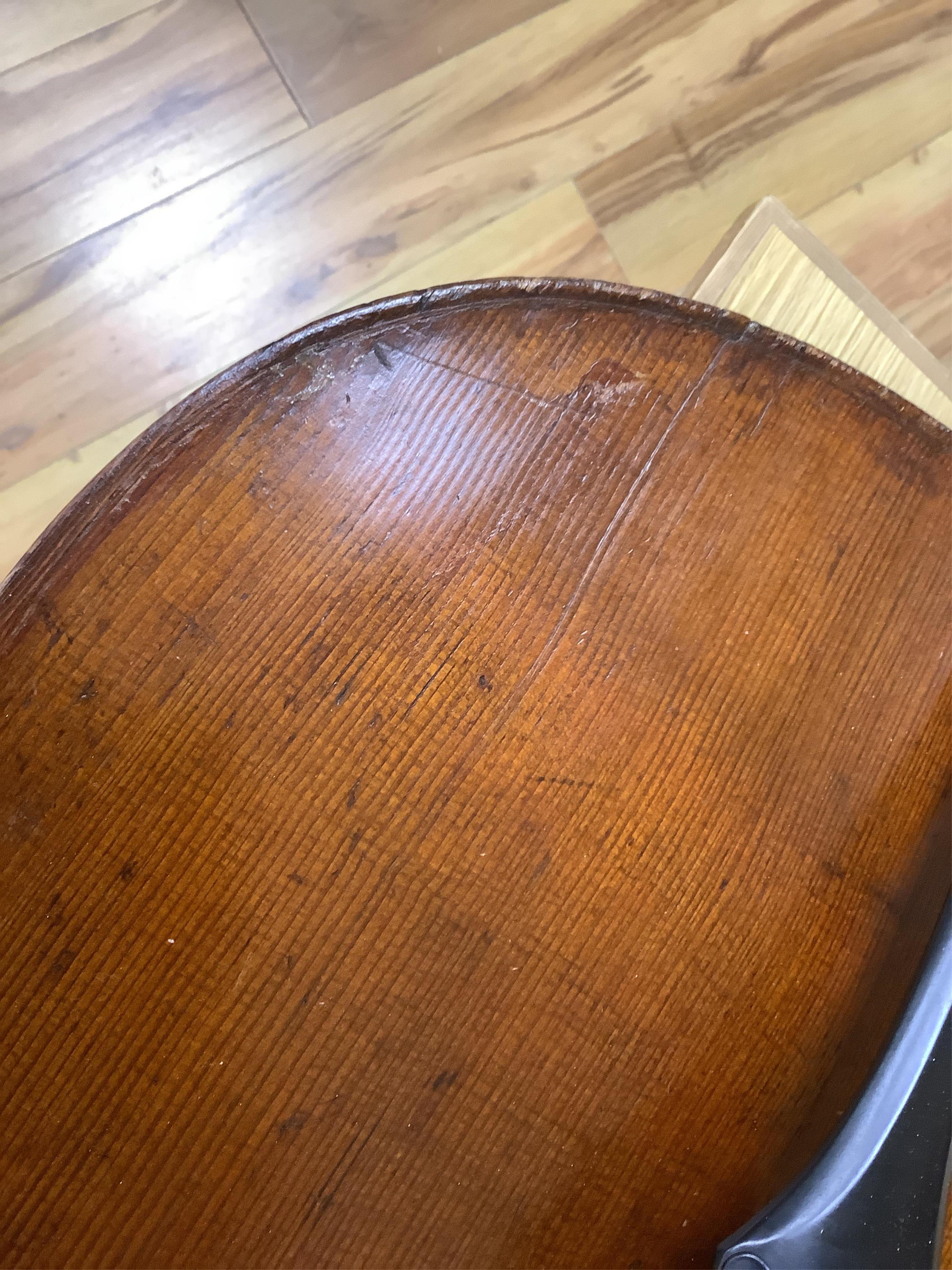 A cased late 19th century German? cello, body length 75cm, together with two bows. Condition - fair to good.